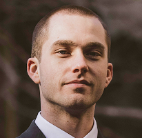 Thomas Whitfield, obchodní analytik specializující se na kryptoměnový trh, headshot